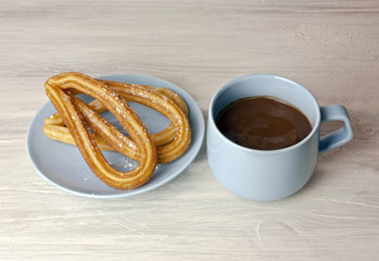 Churros with chocolate, traditional Spanish breakfast