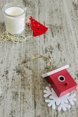 Christmas toys, decor, house, candle. Empty copy space for inscription Idea of merry new year