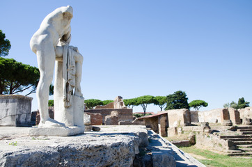 Ruins of Ostia antica, Italy. Republican sacred area, statue of Hercules