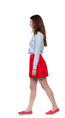 back view of walking  woman. beautiful blonde girl in motion.  backside view of person.  Rear view people collection. Isolated over white background. 