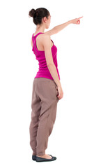 Back view of  pointing woman. beautiful girl. Rear view people collection.  backside view of person.  Isolated over white background. dark-skinned girl in a red shirt is cancer and shows a finger