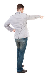 Back view of pointing business man.  Rear view people collection.  backside view of person.  Isolated over white background. A guy in a gray jacket waving his arms.