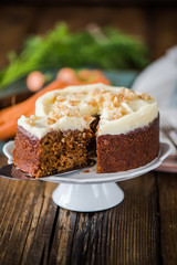 slicing carrot cake, natural light