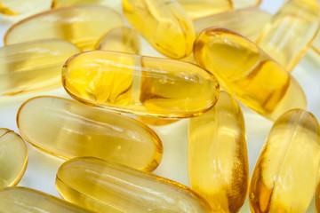 Omega 3 capsules from Fish Oil on white background.