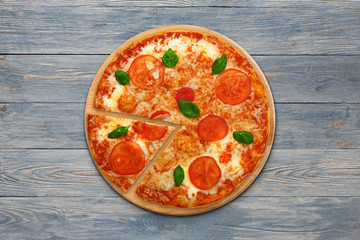 Delicious italian vegetarian pizza Margherita top view at wood