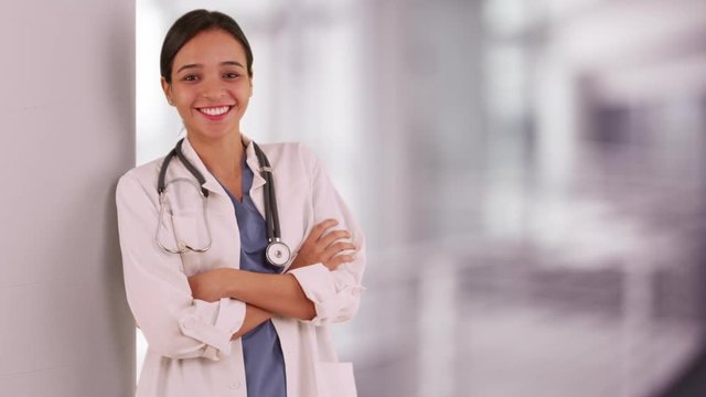 Spanish woman nurse standing in hospital