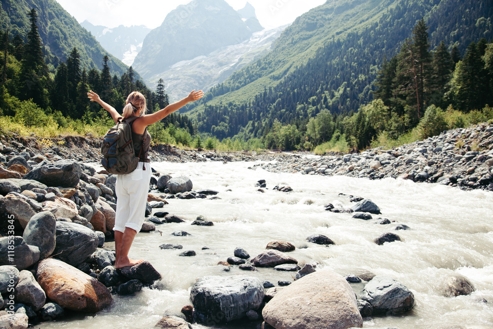 Canvas Prints traveler walking by the river