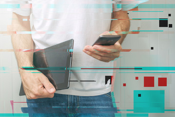 Guy using smartphone and digital tablet, modern mobile electroni