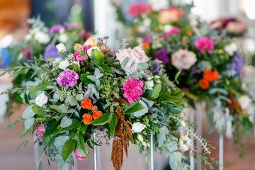 Fototapeta na wymiar wedding ceremony decorations with colorful flowers