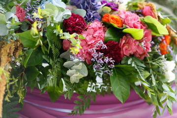 wedding ceremony decorations with colorful flowers