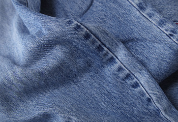 Naklejka premium A full page close up of blue denim jean fabric texture