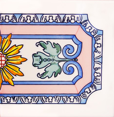 Detail of the traditional tiles from facade of old house