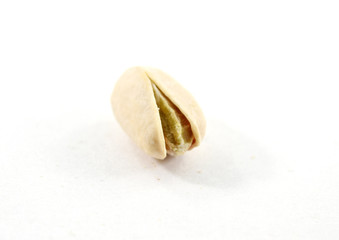 Fototapeta na wymiar Healthy green pistachio in shell