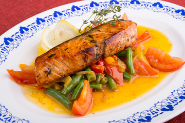 Fried salmon with vegetables stew