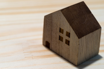 Obraz na płótnie Canvas Home image. Wooden model of house.