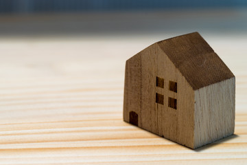 Obraz na płótnie Canvas Home image. Wooden model of house.