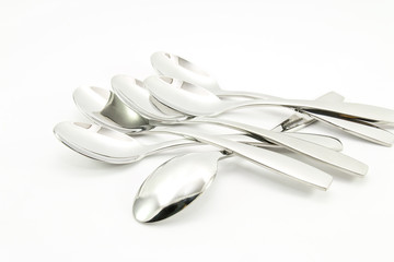 Metal spoons isolated on a white background