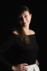 Young girl on black background