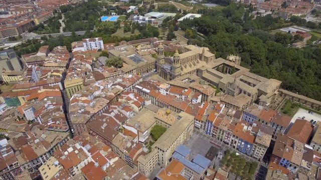 Flying above narrow city streets in Pamplona, Spain