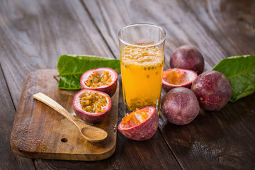 Fresh passion fruits on a wooden background