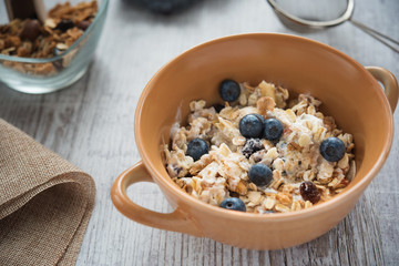 Fresh and diet muesli and yoghurt for breakfast