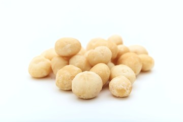 Fototapeta na wymiar Macadamia nuts on white background