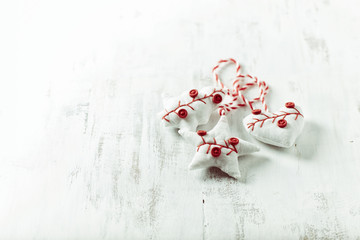 Vintage Christmas decorations on a white wooden surface


