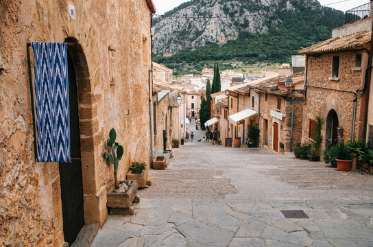 Long stairway with a lot of steps to the Calvary church from the center of Pollensa, Mallorca.