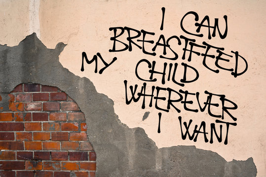 I Can Breastfeed My Child Wherever I Want - Handwritten graffiti sprayed on the wall, anarchist aesthetics - appeal to have freedom of breastfeeding / nursing in public