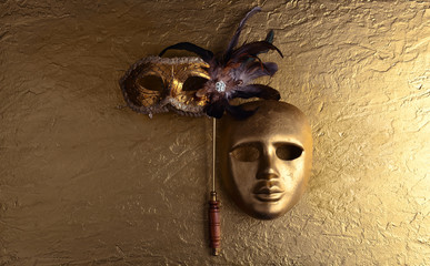 carnival masks on a golden background
