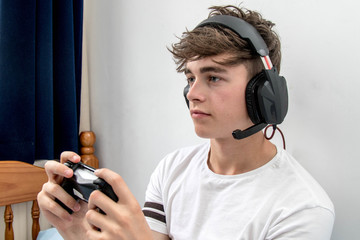 Teenage boy playing a video game