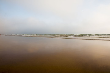 Beach, coast and wave in a summer day