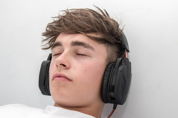 Teenage boy listening to music