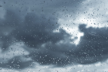 Rain / Water drop of rain on glass with outdoor background