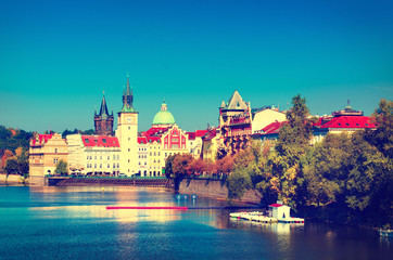 Fototapeta na wymiar Prague Castle and Old City day view with blue sky, travel vivid autumn european background