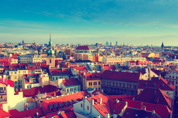 Fototapeta na wymiar Red Prague roofs - view from the City Hall, travel european vintage hipster background