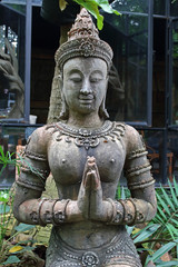 Apsara statue extended the welcome on garden
