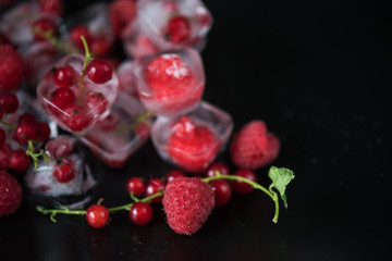 Frozen berries on wooden table