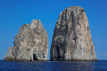 Fototapeta na wymiar Faraglioni rocks at Capri island, Mediterranean Sea, Italy