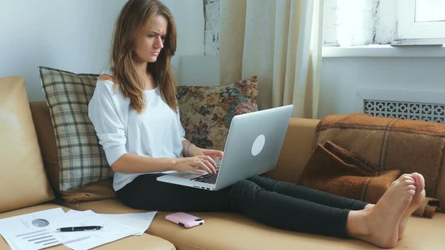Stressed woman using laptop than closed it