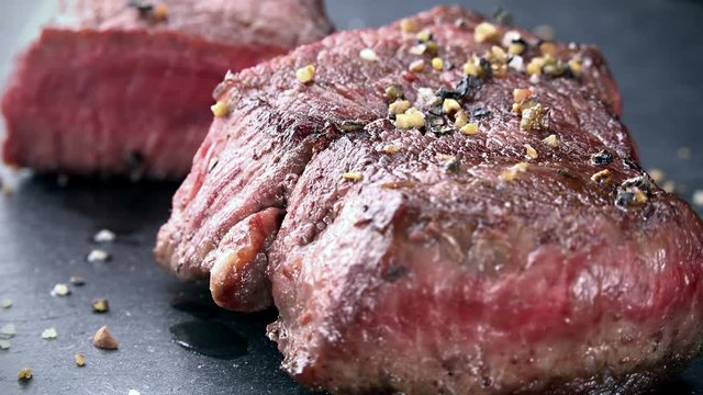 Portion of grilled Beef as not loopable 4K UHD footage