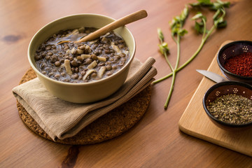 Fototapeta premium Lentil Soup on a wooden surface.