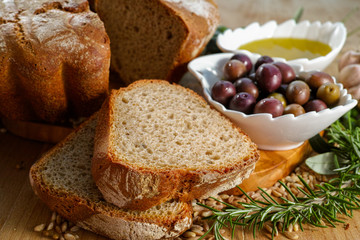 Freshly baked homemade sourdough spelt bread, extra virgin olive