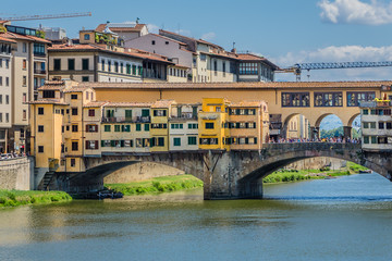 Bridge Ponte Vecchio (1345) on Arno river in Florence, Italy.