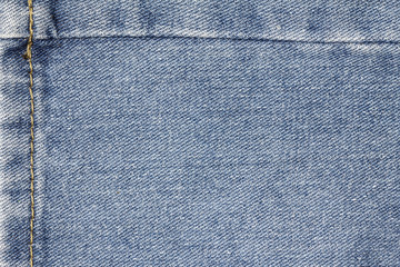 Denim jeans texture or denim jeans background with seam of jeans fashion design with copy space for text or image.