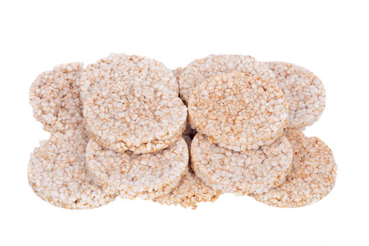 Brown organic rice cakes separated on white background