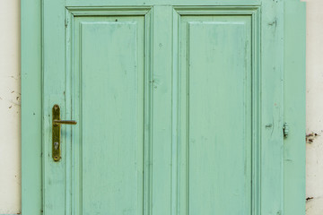 Old green wooden door