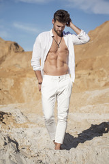 Fototapeta premium Handsome sexy man in the desert