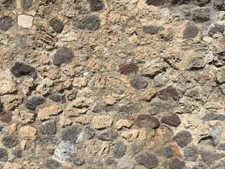 Antique stone background, wall with cracks, old times