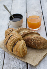 Continental breakfast with coffee, juice, butter and pastry